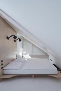 Voodi või voodid majutusasutuse Štajnhaus toas