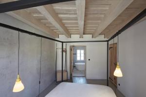 Voodi või voodid majutusasutuse Štajnhaus toas
