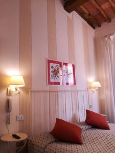 Postel nebo postele na pokoji v ubytování Villa Ducci