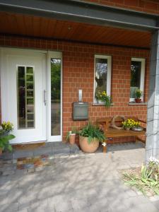 a brick house with a tv on the side of it at Silvia Busche in Obernkirchen