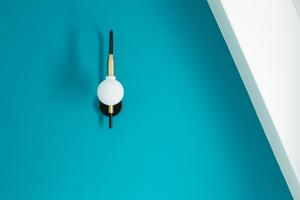 an overhead view of a light bulb on a blue background at Hotel Haussmann Saint Augustin in Paris +31 photos