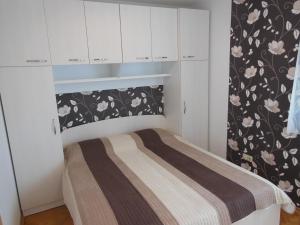 Posteľ alebo postele v izbe v ubytovaní Petar Apartments