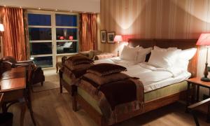 Voodi või voodid majutusasutuse Eriksberg Hotel & Nature Reserve toas