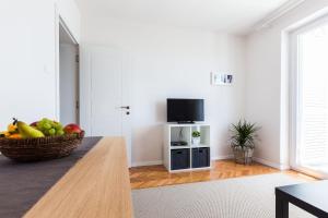 Telewizja i/lub zestaw kina domowego w obiekcie Apartments Tomislav Primorska