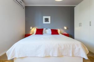 Łóżko lub łóżka w pokoju w obiekcie Apartments Tomislav Primorska