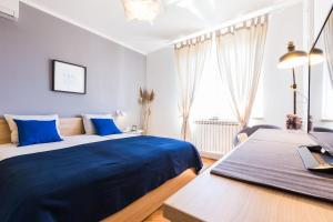 Łóżko lub łóżka w pokoju w obiekcie Apartments Tomislav Primorska
