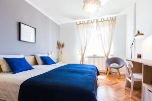 Łóżko lub łóżka w pokoju w obiekcie Apartments Tomislav Primorska
