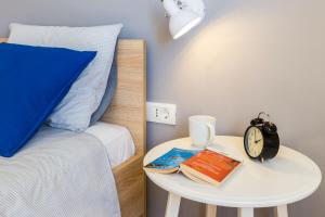 Łóżko lub łóżka w pokoju w obiekcie Apartments Tomislav Primorska