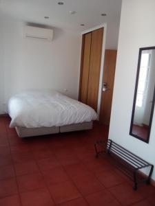 Кровать или кровати в номере Casa Da Planicie