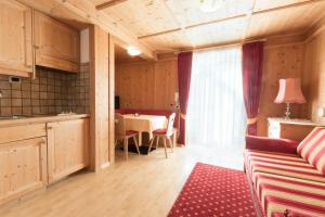 Kuchyň nebo kuchyňský kout v ubytování Pension Garden Hotel