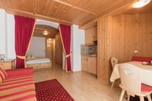 Postel nebo postele na pokoji v ubytování Pension Garden Hotel