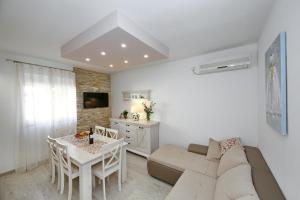 Posezení v ubytování Apartment Nela + 12 fotografií