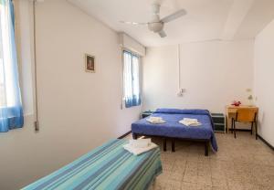 Säng eller sängar i ett rum på Villa San Francesco