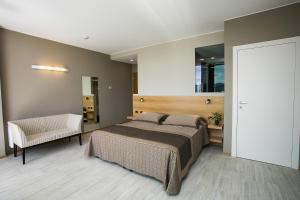 Voodi või voodid majutusasutuse Hotel Abano Astoria toas