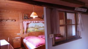 Postel nebo postele na pokoji v ubytování Albergo Gasthof zur Krone