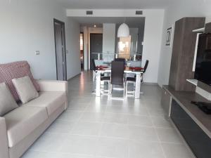 Luxury ground floor apartment Terrazzas de Campoamor PG009にあるシーティングエリア