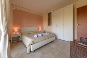 Katil atau katil-katil dalam bilik di Villa Moreschi