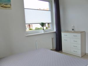 Postel nebo postele na pokoji v ubytování Apartament Białe Piaski