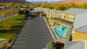 an aerial view of a house with a swimming pool at Moab Valley Inn in Moab