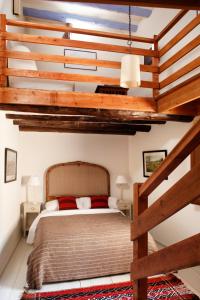 A bed or beds in a room at Hotel Mas de la Serra