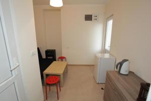 Kuchyň nebo kuchyňský kout v ubytování Sukhum City Mini Hotel