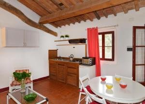 Kuchyň nebo kuchyňský kout v ubytování Agriturismo Tenuta Vallelunga