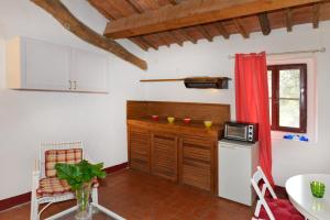 Kuchyň nebo kuchyňský kout v ubytování Agriturismo Tenuta Vallelunga