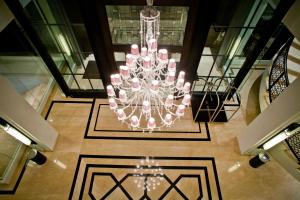 an overhead view of a chandelier in a building at Samala Hotel Jakarta Cengkareng in Jakarta