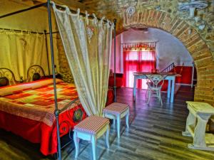 Agriturismo La Poderina客房内的一张或多张床位
