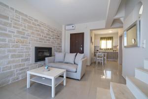 Posezení v ubytování Triopetra view villa Elysian
