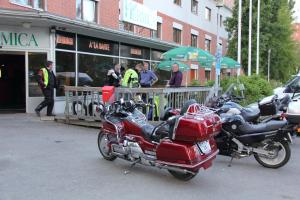 motorcycles parked in front of a building at Hotel Hermica in Tampere
