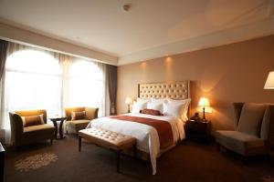 Postel nebo postele na pokoji v ubytování Shanghai Fenyang Garden Boutique Hotel