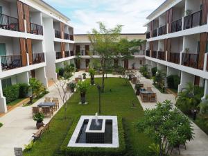 an empty courtyard of an apartment building at Crystal Lamai Hotel in Lamai