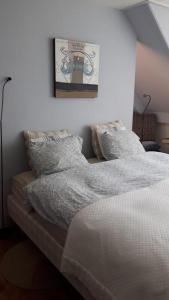 Cama o camas de una habitación en Het Woonrijk