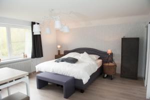 Postel nebo postele na pokoji v ubytování Villa Lumina
