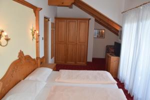 Postel nebo postele na pokoji v ubytování Hotel Tannhof