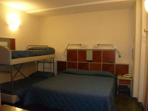 Postel nebo postele na pokoji v ubytování Hotel Derby