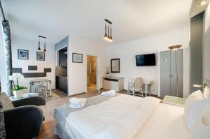 Posteľ alebo postele v izbe v ubytovaní Apartamenty Łozówka