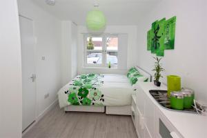 Postel nebo postele na pokoji v ubytování Gala Rooms Homestay - Free Parking