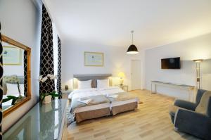 Posteľ alebo postele v izbe v ubytovaní Apartamenty Łozówka