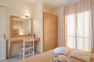 Кровать или кровати в номере Mare Hotel Apartments