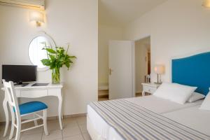Кровать или кровати в номере Mare Hotel Apartments