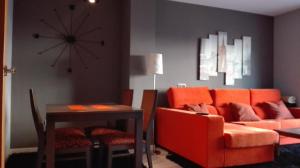 A seating area at rosa sensat