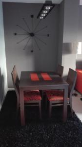 A seating area at rosa sensat
