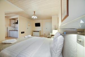 Posteľ alebo postele v izbe v ubytovaní Apartamenty Łozówka