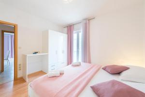 Letto o letti in una camera di Apartments Nikolina