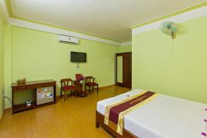 TV a/nebo společenská místnost v ubytování Hoi An Life Villa