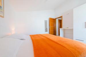 Letto o letti in una camera di Apartments Nikolina