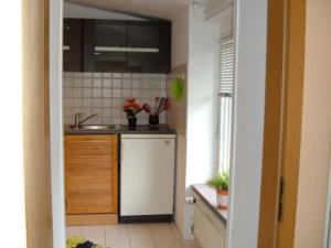 Η κουζίνα ή μικρή κουζίνα στο Ferienbungalow 3