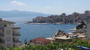 a view of a city and a body of water at Hostel Andrey in Sarandë +45 photos